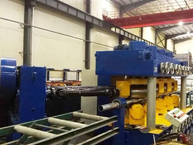 Vertical multi-roll straightening machine